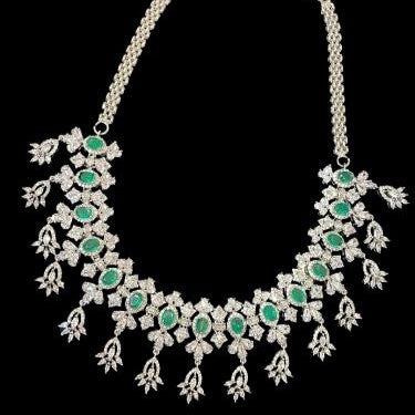 Emerald and Diamond Floral Necklace.