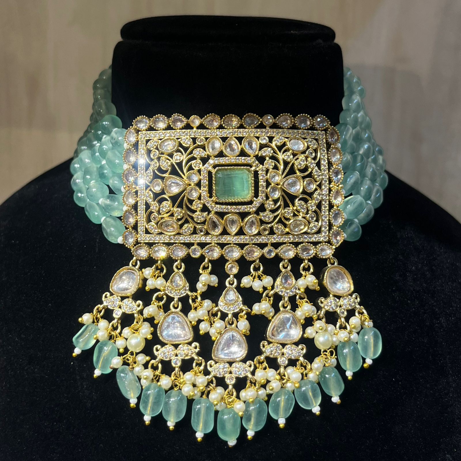 Polki Choker Necklace with Emerald Centerpiece.