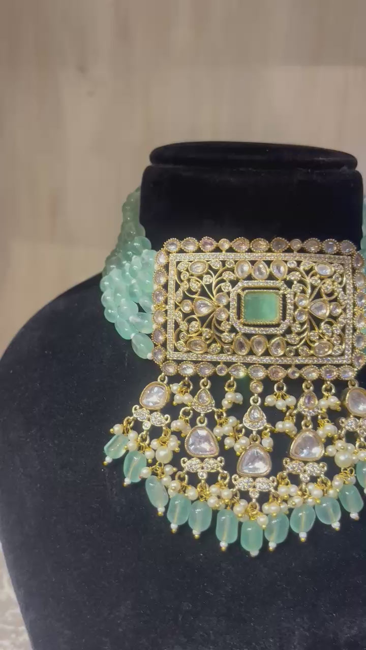 Polki Choker Necklace with Emerald Centerpiece.